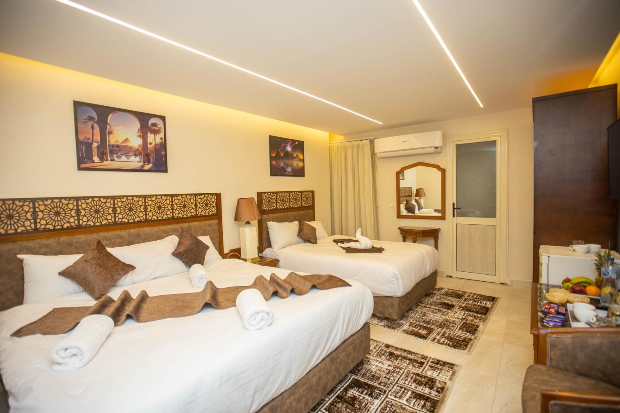 The Muse Pyramids Inn Hotel Kafrat al Jabal Exterior photo