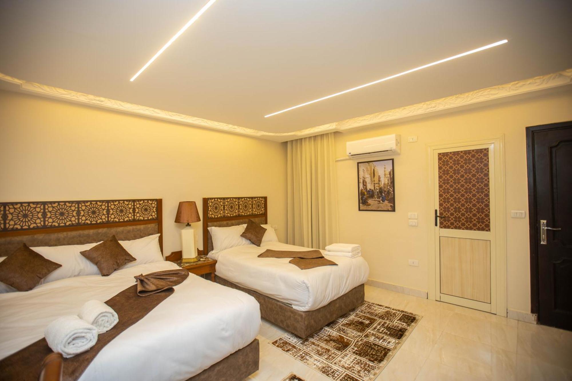 The Muse Pyramids Inn Hotel Kafrat al Jabal Exterior photo